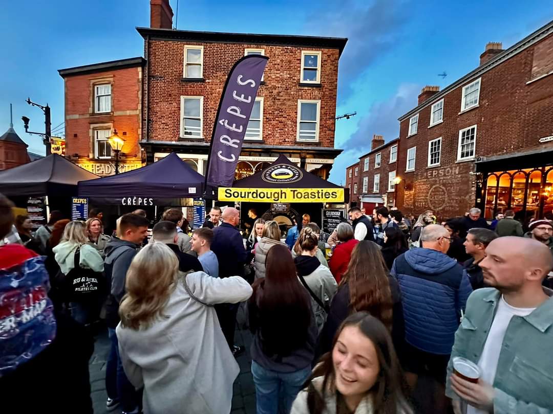 Sourdough Toasties stand with people gathered around